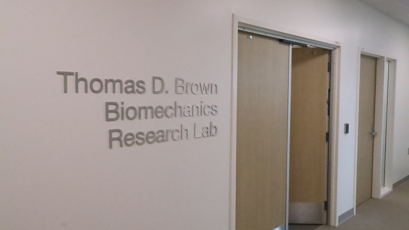 Image of the doorway to the lab showing the name Thomas D Brown Research Lab
